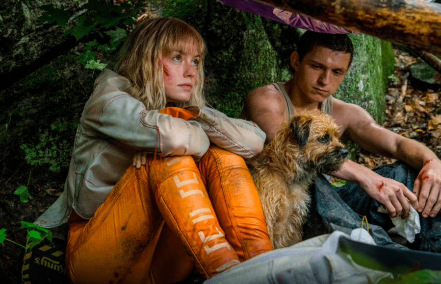 Daisy Ridley as ‘Viola Eade,’ Manchee the dog, and Tom Holland as ‘Todd Hewitt’ in CHAOS WALKING.