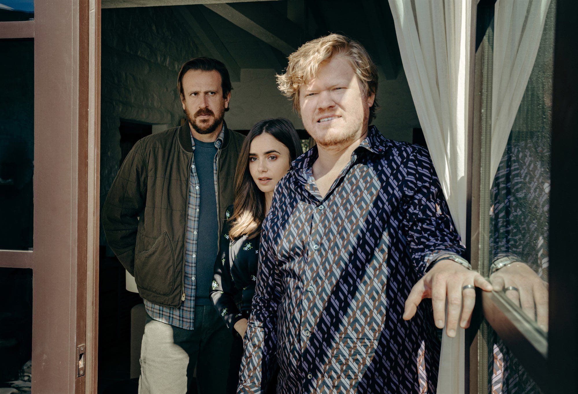 WINDFALL - (L-R) LILY COLLINS as WIFE, JESSE PLEMONS as CEO and JASON SEGEL as NOBODY. 